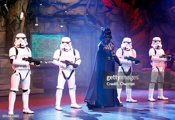 Darth Vader and Stormtrooper characters from "Star Wars : The Force Awakens" pose during "Star Wars: Episode VII - The Force Awakens" party at...