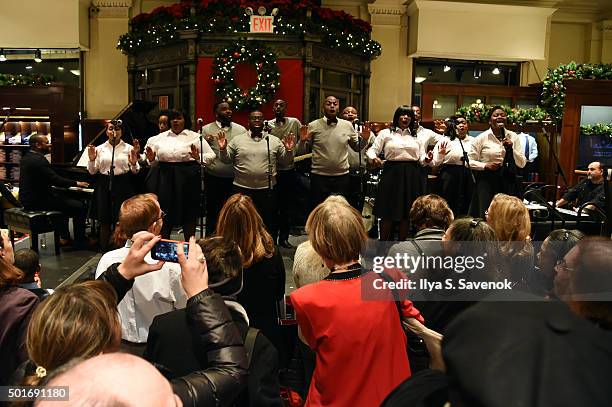 Boy's and Girl's Choir of Harlem Alumni Ensemble perform onstage at Brooks Brothers holiday celebration with St. Jude Children's Research Hospital...