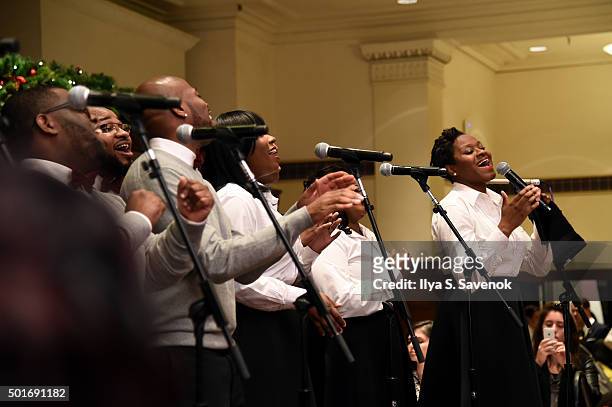 Boy's and Girl's Choir of Harlem Alumni Ensemble perform onstage at Brooks Brothers holiday celebration with St. Jude Children's Research Hospital...