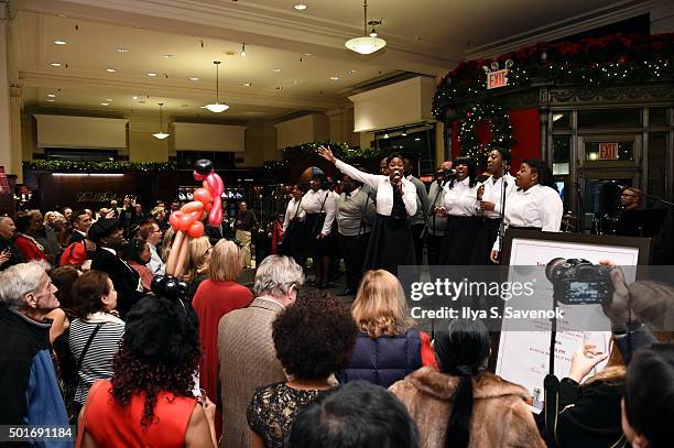 Boy's and Girl's Choir of Harlem Alumni Ensemble perform onstage at Brooks Brothers holiday celebration with St. Jude Children's Research Hospital...