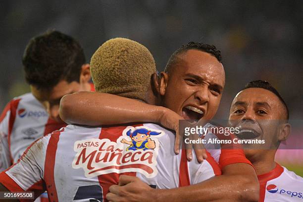 Edinson Toloza of Junior celebrates with teammates after scoring the second goal of his team during a first leg final match between Atletico Junior...
