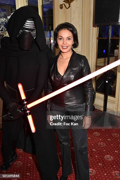 Actress/producer Saida Jawad poses with a 'Dark Vador' during the 'Star Wars: Episode VII - The Force Awakens' Screening Party Hosted by S.T. Dupont...