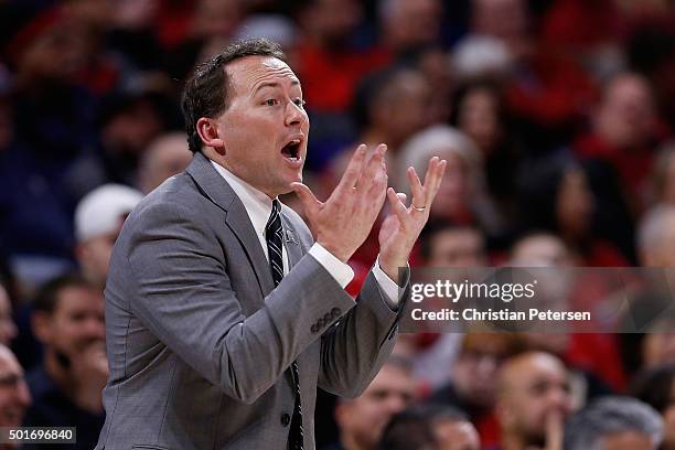 Head coach Jack Murphy of the Northern Arizona Lumberjacks reacts during the second half of the college basketball game against the Arizona Wildcats...