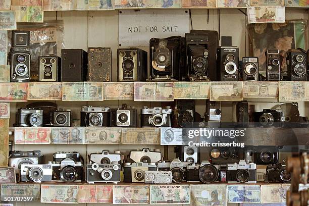 vintage cameras and currency - kodak collection stock pictures, royalty-free photos & images