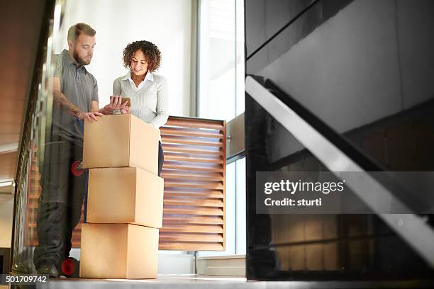 business parcel courier - receiving delivery stock pictures, royalty-free photos & images