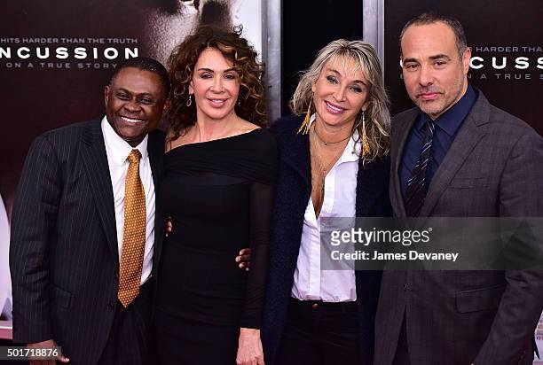 Dr. Bennet Omalu, Giannina Scott, guest and Peter Landesman attend the "Concussion" premiere at AMC Loews Lincoln Square on December 16, 2015 in New...