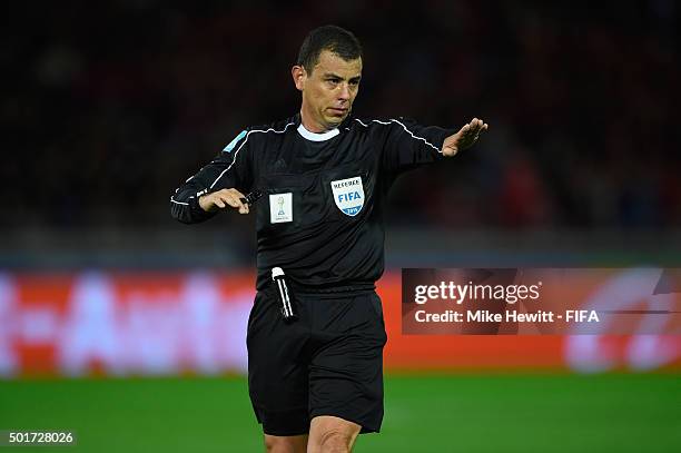 Referee Joel Aguilar of Salvador in action during the FIFA Club World Cup Japan 2015 Semi Final match between Barcelona and Guangzhou Evergrande FC...