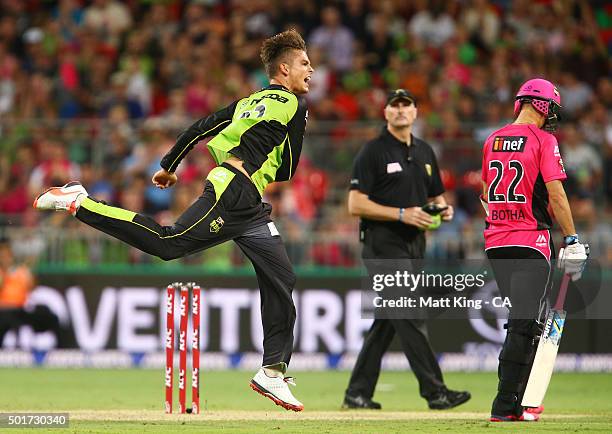 Chris Green of the Thunder celebrates taking the wicket of Ryan Carters of the Sixers during the Big Bash League match between the Sydney Thunder and...