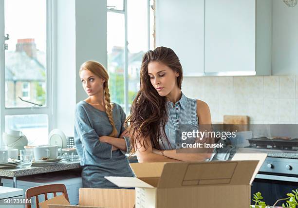 conflict between roommates - zus stockfoto's en -beelden