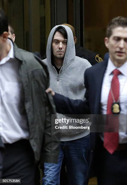 Martin Shkreli, chief executive officer of Turing Pharmaceuticals LLC, exits federal court in New York, U.S., on Thursday, Dec. 17, 2015. Shkreli was...