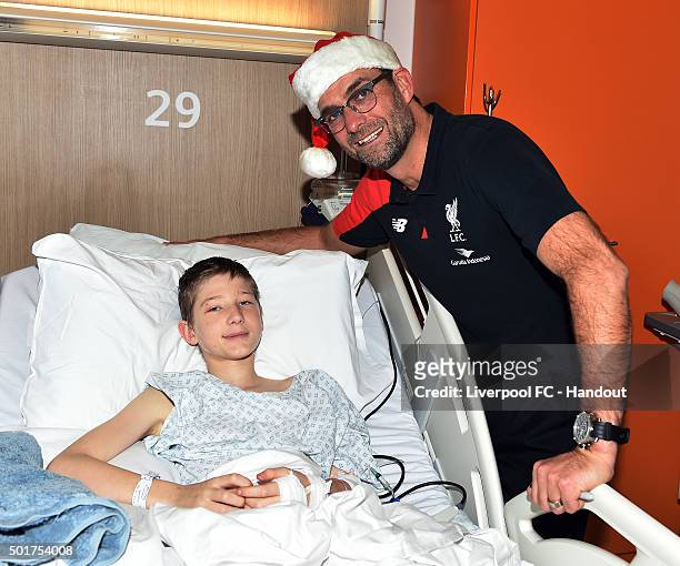 In this handout image from Liverpool FC, Jurgen Klopp manager of Liverpool at Alder Hey Children's Hospital on December 17, 2015 in Liverpool,...