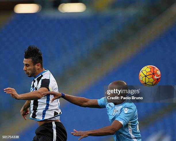 Abdoulay Konko of SS Lazio competes for the ball with Altameeni Ali Adnan of Udinese Calcio during the TIM Cup match between SS Lazio and Udinese...