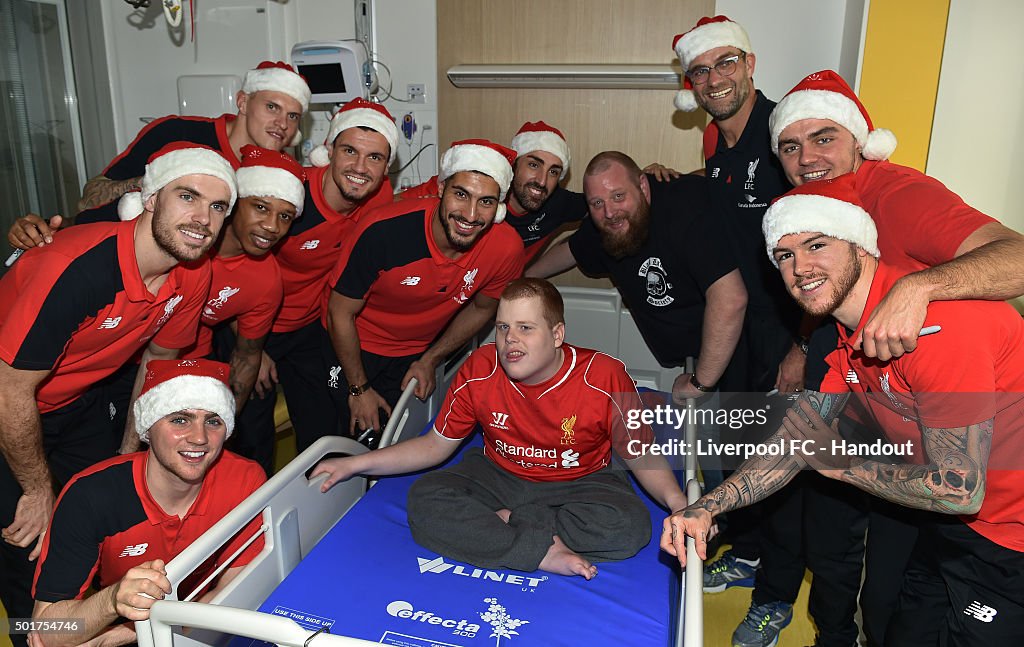 Liverpool Players Deliver Presents to Alder Hey Hospital