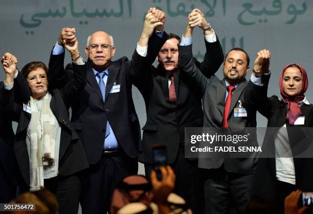 Libya's General National Congress deputy president Saleh al-Makhzoum , the new national government head, Prime Minister, Fayez al-Sarraj and the head...