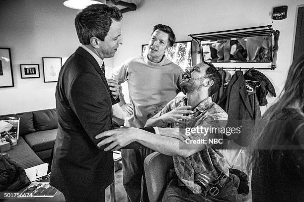 Episode 303 -- Pictured: Host Seth Meyers talks with comedians John Mulaney and Nick Kroll backstage on December 16, 2015 --