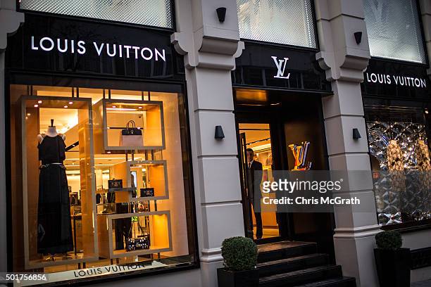 Security guard looks out the door of Louis Vuitton store in the famous Nisantasi shopping district on December 17, 2015 in Istanbul, Turkey. With the...