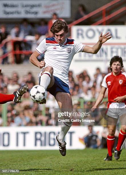 England player Glenn Hoddle in action against Wales at the Racecourse Ground during a Home International match between Wales and England on May 17,...