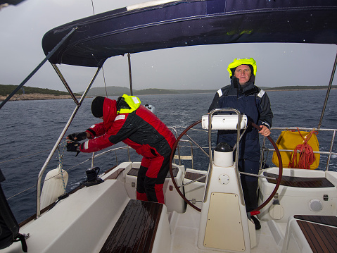 Tim Ray Sailing Tim building Business man sailing on rainy weather, Croatia 이미지 ...