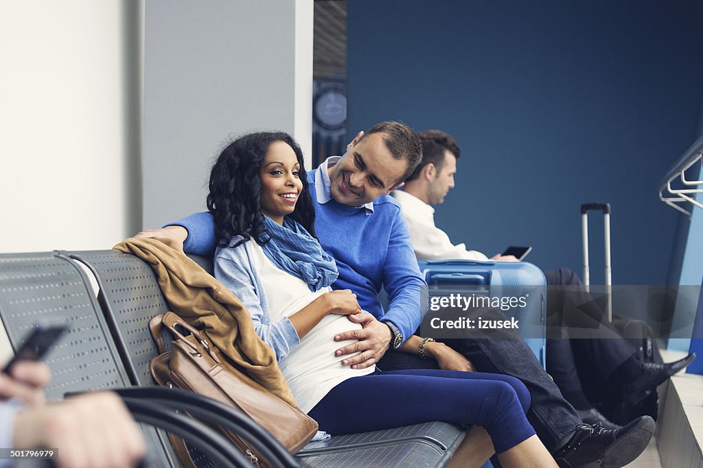 Couple waiting for flight