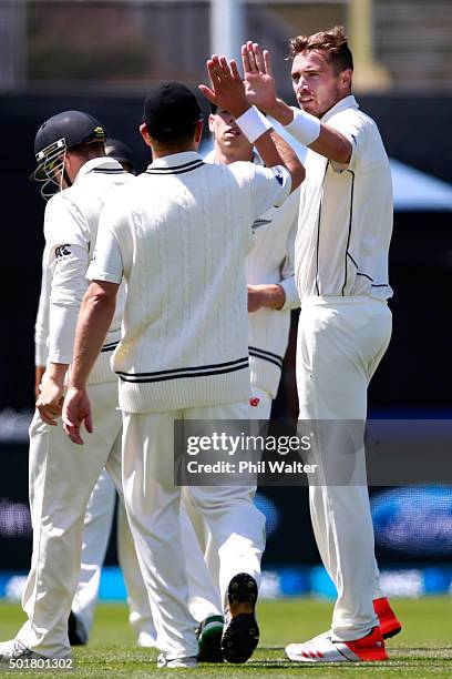 Tim Southee of New Zealand celebrates his wicket of Dimuth Karunaratne of Sri Lanka during day one of the Second Test match between New Zealand and...