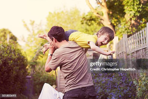 garden play time - children playing outside stock pictures, royalty-free photos & images