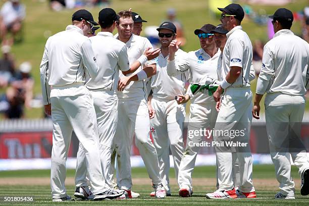 Doug Bracewell of New Zealand celebrates his wicket of Dinesh Chandimal of Sri Lanka during day one of the Second Test match between New Zealand and...