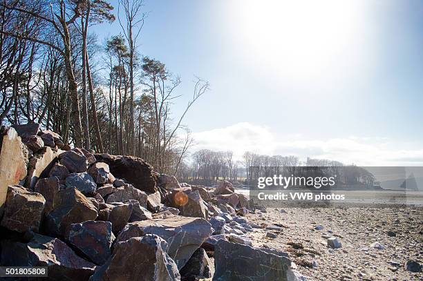idyllic beach with sunflare - otter ferry stock pictures, royalty-free photos & images