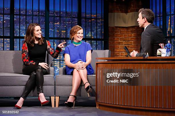 Episode 304 -- Pictured: Tina Fey and Amy Poehler during an interview with host Seth Meyers on December 17, 2015 --