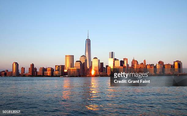 view of lower manhattan - new york city sunrise stock pictures, royalty-free photos & images