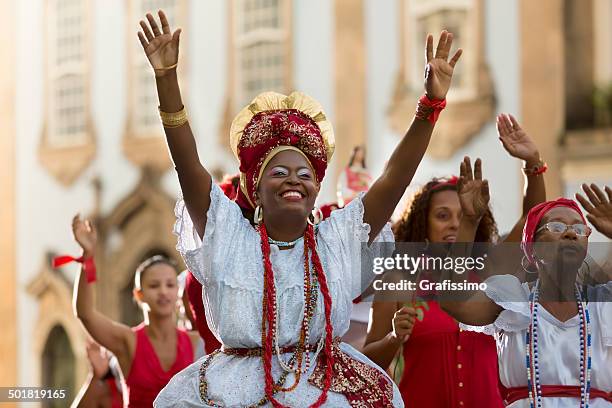 brazil baianas celebrating saint barbara in salvador - macumba stock pictures, royalty-free photos & images