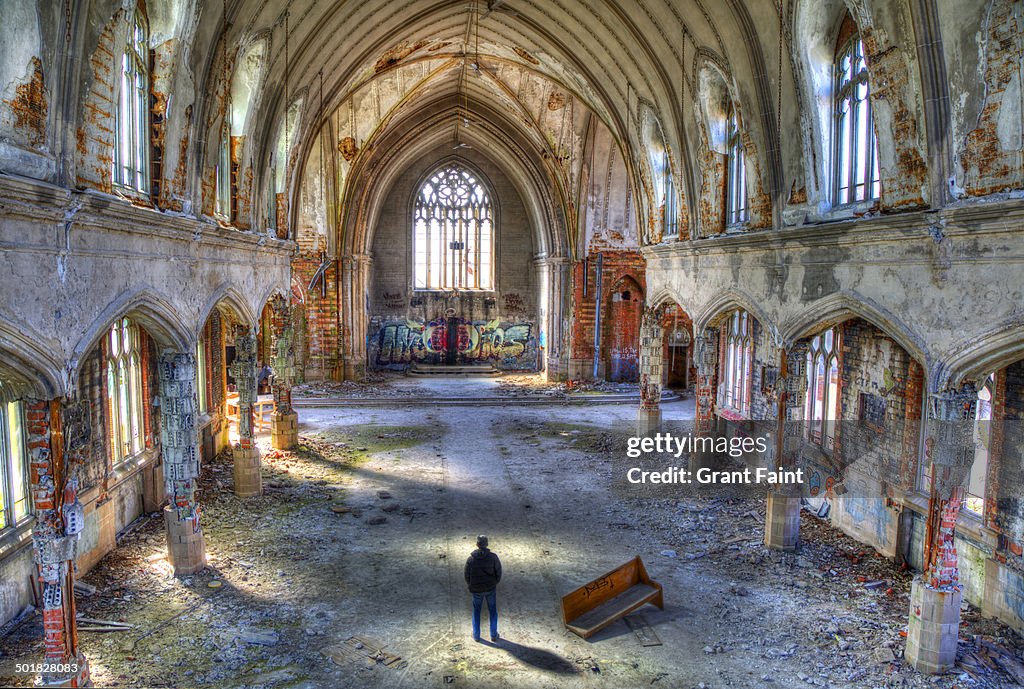 Man standing in abandoned church