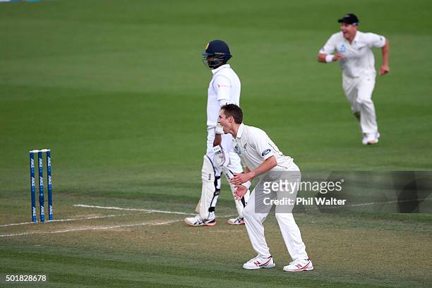 Trent Boult of New Zealand celebrates his wicket of Kithuruwan Vithanage of Sri Lanka during day one of the Second Test match between New Zealand and...