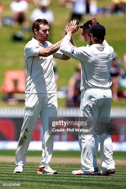 Doug Bracewell of New Zealand celebrates his wicket of Dinesh Chandimal of Sri Lanka during day one of the Second Test match between New Zealand and...