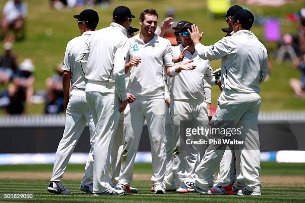 Doug Bracewell of New Zealand celebrates his wicket of Dinesh Chandimal of Sri Lanka during day one of the Second Test match between New Zealand and...