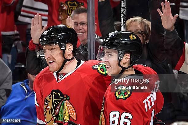 Marian Hossa and Teuvo Teravainen of the Chicago Blackhawks celebrate after Teravainen scored against the Edmonton Oilers in the third period of the...