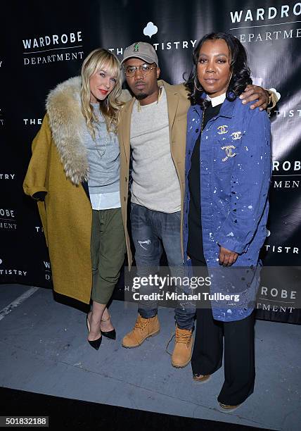 April Roomet, hip-hop artist Nas and Arell Hughes attend the grand opening of the Wardrobe Department LA store at Wardrobe Department on December 17,...