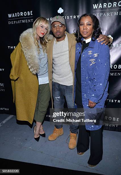 April Roomet, hip-hop artist Nas and Arell Hughes attend the grand opening of the Wardrobe Department LA store at Wardrobe Department on December 17,...