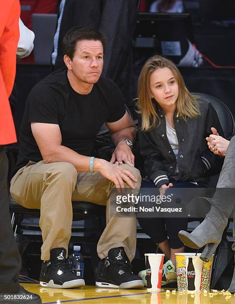 Mark Wahlberg and his daughter Ella Rae Wahlberg attend a basketball game between the Houston Rockets and the Los Angeles Lakers at Staples Center on...