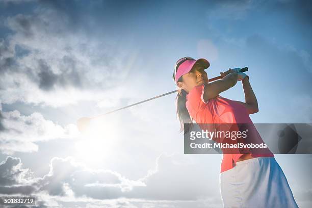 ゴルフスイング - golf woman ストックフォトと画像