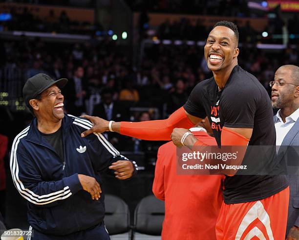 Denzel Washington and Dwight Howard attend a basketball game between the Houston Rockets and the Los Angeles Lakers at Staples Center on December 17,...