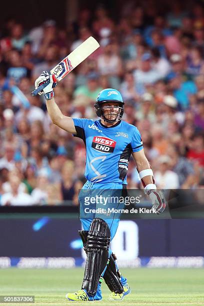 Brad Hodge of the Adelaide Strikers celebrates after reaching 50 runs during the Big Bash League match between the Adelaide Strikers and the...