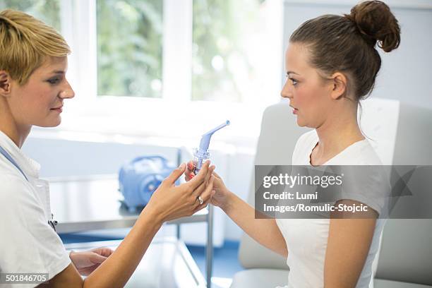 female patient undergoing lung function test, munich, bavaria, germany - spirometer stock pictures, royalty-free photos & images