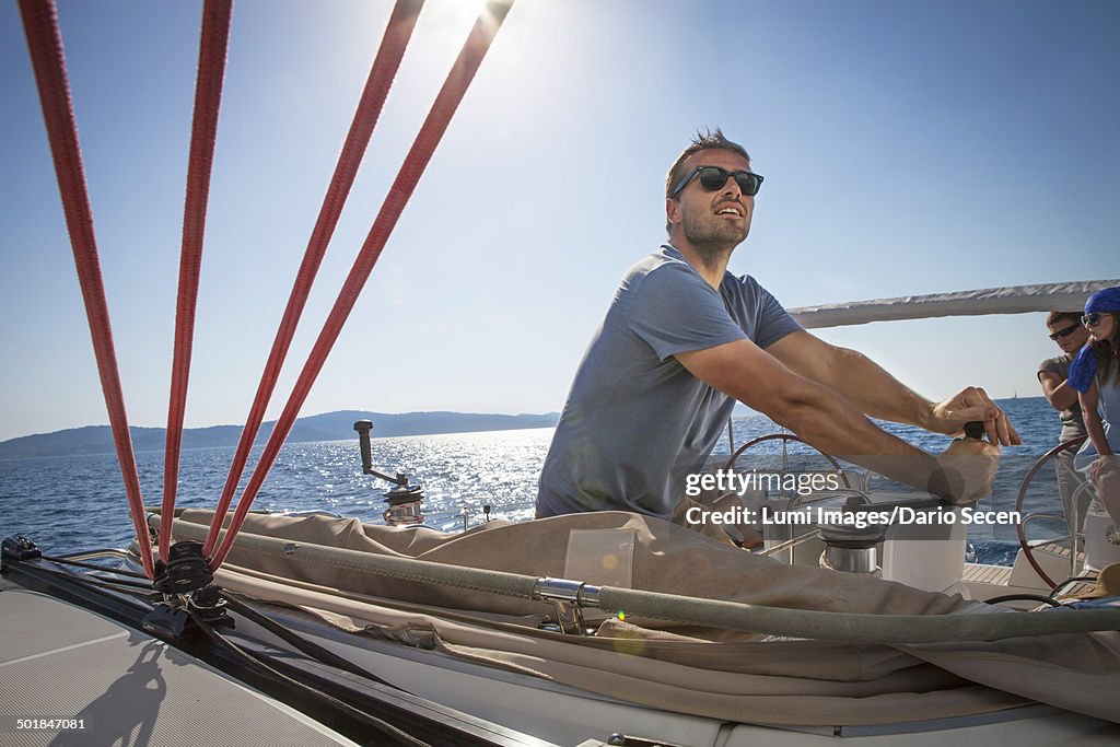 Croatia, Adriatic Sea, Young man on sailboat