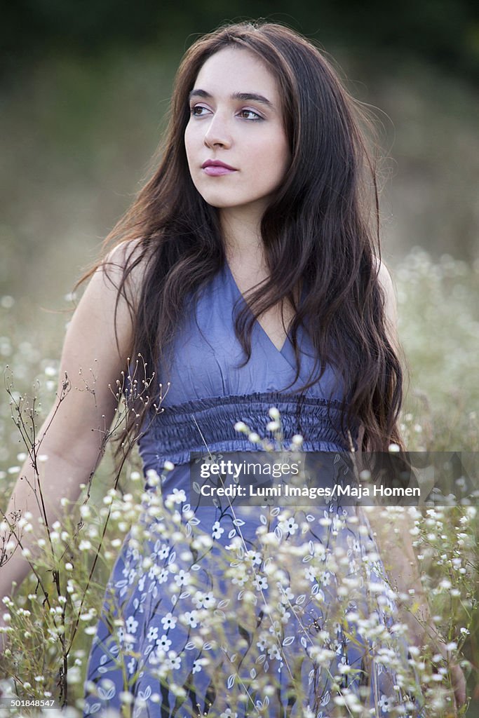 Young woman with long hair in the meadow, Croatia, Europe