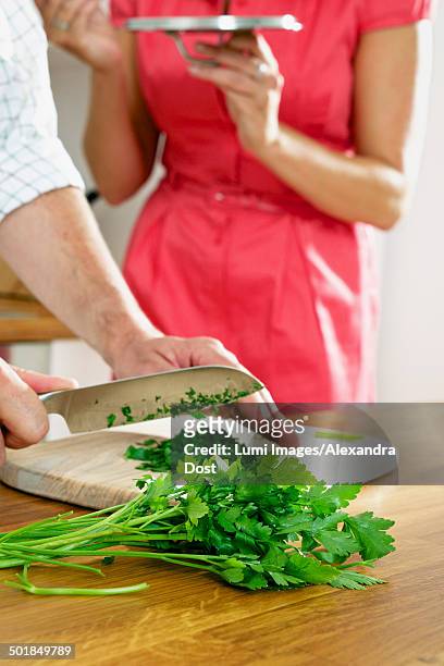 couple cooking together - alexandra dost stock-fotos und bilder