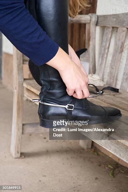 woman wearing riding boots, baden wuerttemberg, germany, europe - alexandra dost stock-fotos und bilder