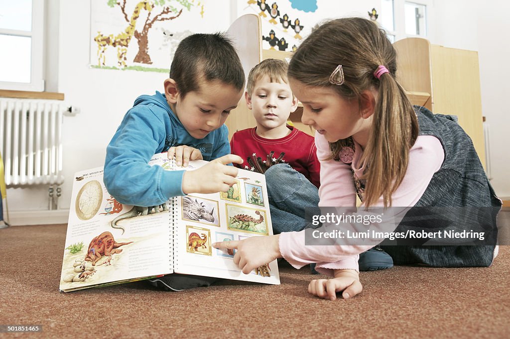 Children With Picture Book, Kottgeisering, Bavaria, Germany, Europe