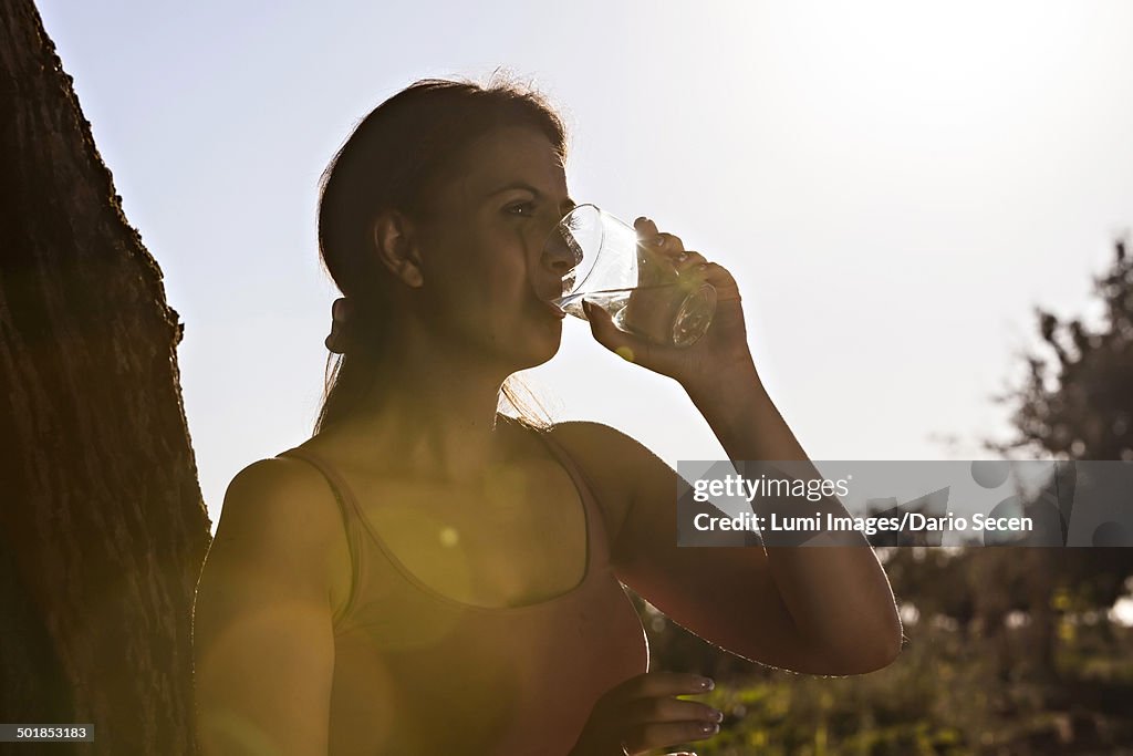 Young Woman Drinking A Glass Of Water, Croatia, Slavonia, Europe