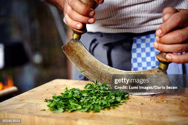 person chopping fresh herbs - mincing knife stock pictures, royalty-free photos & images