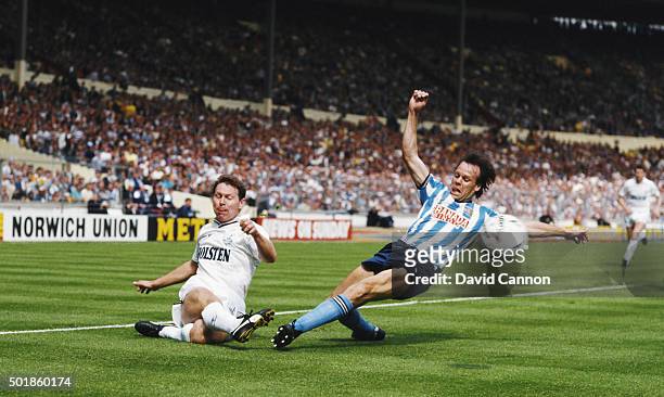 Spurs striker Clive Allen gets in a cross despite the attentions of Coventry defender Trevor Peake during the 1987 FA Cup Final between Coventry City...